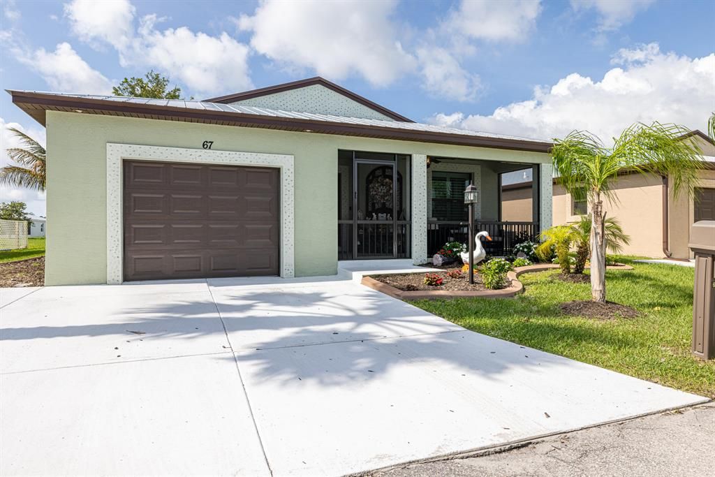 Photo of 67 El Camino Real Real, Port St Lucie, FL 34952 (MLS # R10883490)