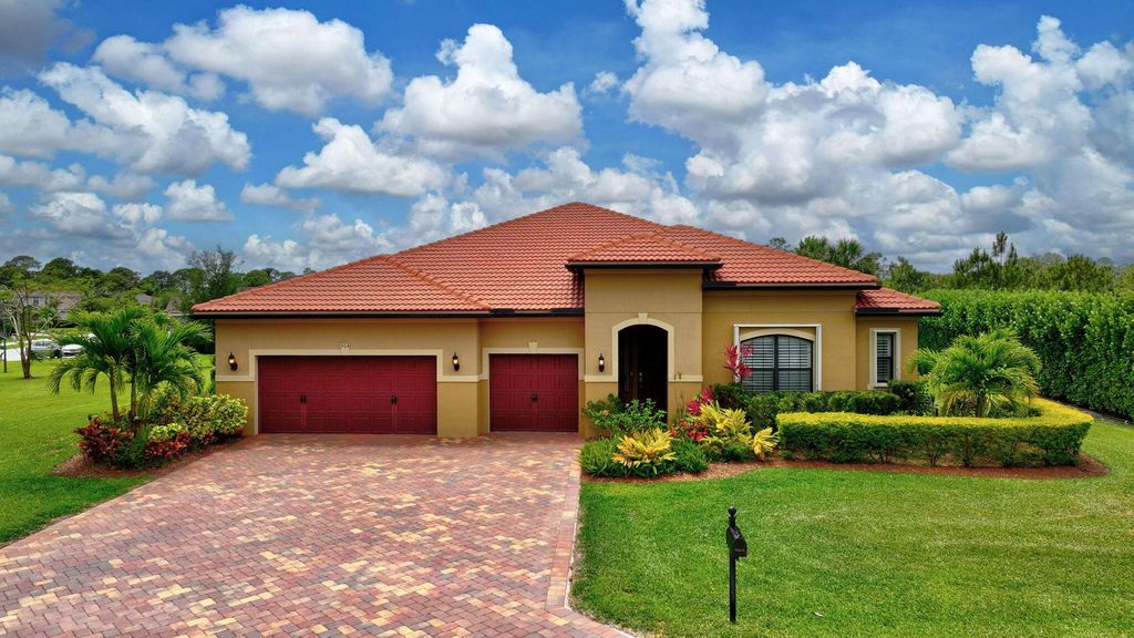 Photo of 964 SW Canoe Creek Terrace, Palm City, FL 34990 (MLS # R11087963)