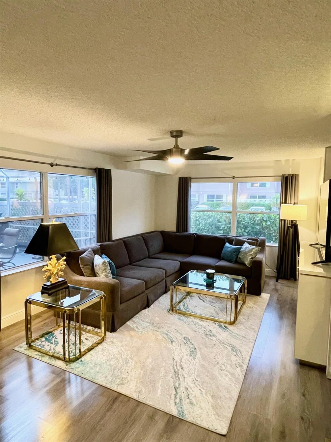 This immaculate and move-in-ready townhome offers the perfect blend of comfort, style, and peace of mind. Step outside to your private fenced courtyard or unwind in the fully screened-in patio--ideal for enjoying Florida's beautiful weather year-round. Located in a quiet and friendly neighborhood, the community includes a sparkling pool, tennis court, and playground for all to enjoy.Furniture is negotiable, making this an even more enticing opportunity. Don't miss your chance to own this charming home!