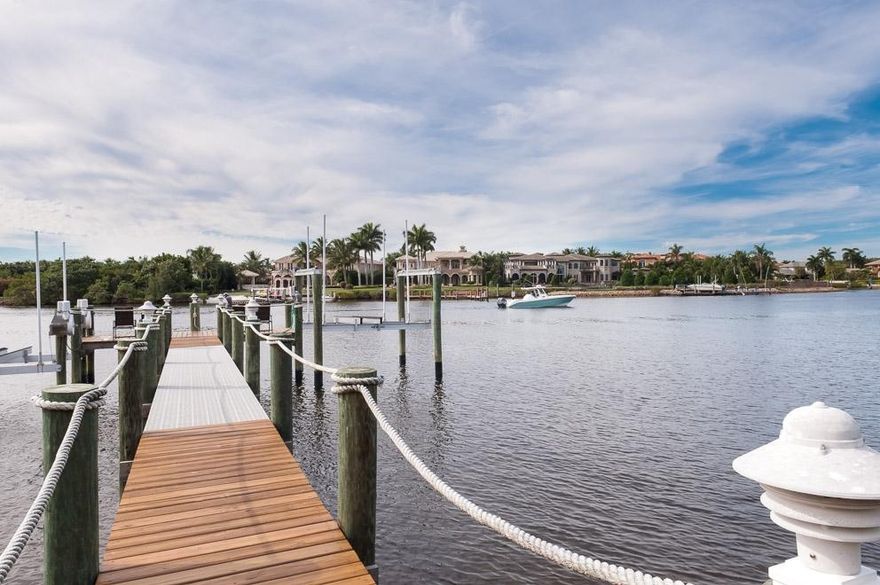 This home is directly on the Intracoastal Waterway with no fixed bridges.  The property has a shared walkway to the dock with the next door neighbor, but it's own slip, lift, electric and water.  Best of all, the owner recently obtained a permit to dredge an additional five feet of depth at the dock. Enjoy a large grassy lawn while watching sunset views over the water.  Across the water are some of the finest homes in Admiral's Cove.