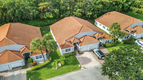 Photo of 8039 N Tranquility Lake Drive, Delray Beach, FL 33446 (MLS # B26039021)