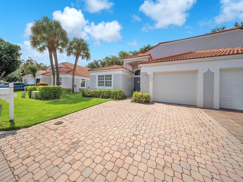 Photo of 8039 N Tranquility Lake Drive, Delray Beach, FL 33446 (MLS # B26039021)
