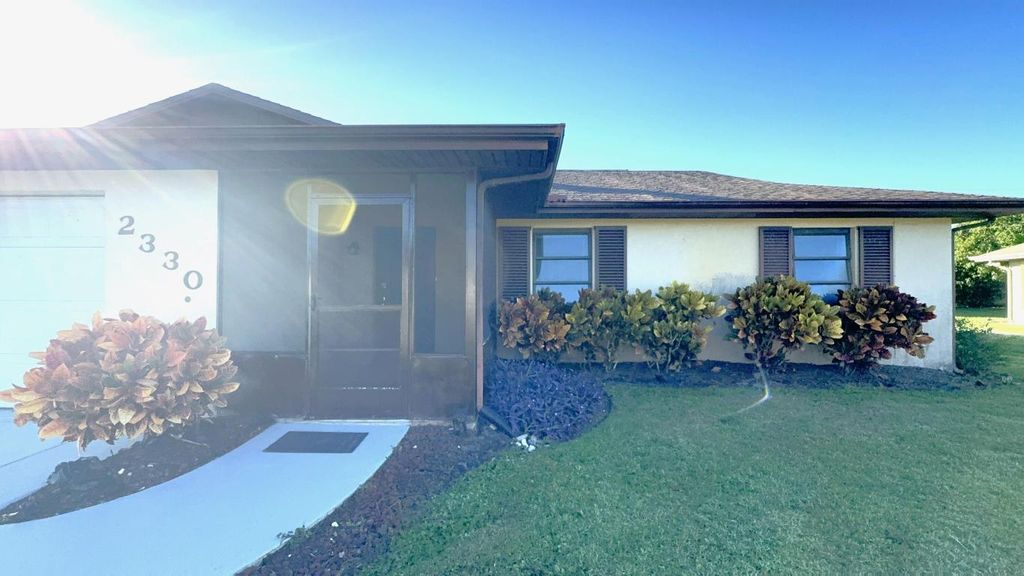 Photo of 2330 SE Avalon Rd, Port Saint Lucie, FL 34952 (MLS # R10946635)