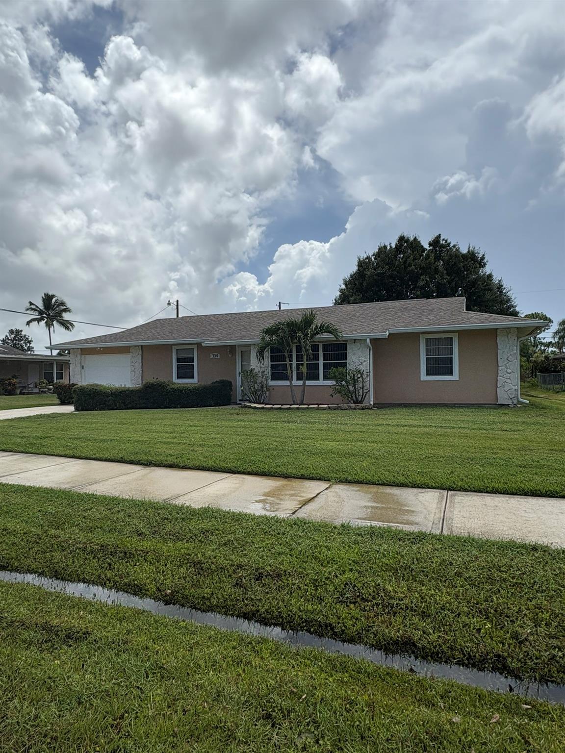 Beautiful and immaculate home with over 1700 SF under air has 3 large bedrooms, 2 neutral tone bathrooms and one car garage. Open concept design for living areas plus additional large family/florida room for entertaining. Bonus room can be used for study, work space or playroom. Kitchen has all new appliances, large pantry and plenty of cabinet space. Washer and dryer laundry closet inside. All ceramic tile and laminate flooring throughout. Also, enjoy the roofed screened patio space as you look at the peaceful yard. Ready to be your new home. Each applicant 18 and over pays a $40 tenant screening fee. First, last and security required for move in. Convenient location near shopping, highways and community events.