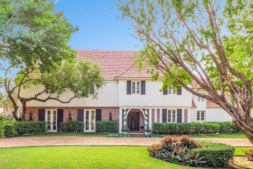 Location, location, location on one of Palm Beach's sought after ''EL street'' estate ocean blocks, close to shopping, between the bridges, airport!  A contemporary-meets-traditional spectacular renovation to this John Volk Tudor-style distinguishes itself amongst the great society architect's work.  It is a special sanctuary facing south on an oversized lot (1.33 acres).  It boasts a 2/1 guest house with living room and kitchen, plus a pool house with two cabana baths. Beautiful outdoor spaces with heated pool and tennis court.  A true value opportunity!