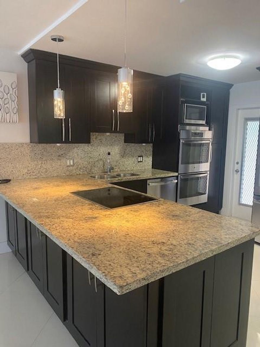 Fantastic opportunity to rent this immaculate condo located in Palm Aire. This spacious unit is in excellent condition featuring porcelain floors throughout, granite countertops in kitchen, SS appliances, double convection oven, wine cooler and ample closet space. Fans in the bedrooms. Enjoy a pleasant lake and garden view from the balcony. Assigned parking and storage included. Community Pool, bbq area in clubhouse, conveniently located about 6 miles from the beach. No pets allowed. Condo association approval required. Water, basic cable is included in the rent.