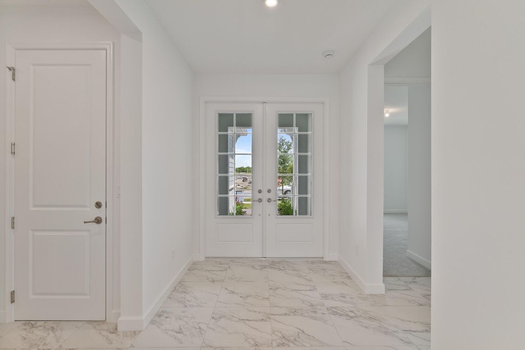 Photo of 9819 SW Veronese Drive, Port Saint Lucie, FL 34987 (MLS # R10972064)
