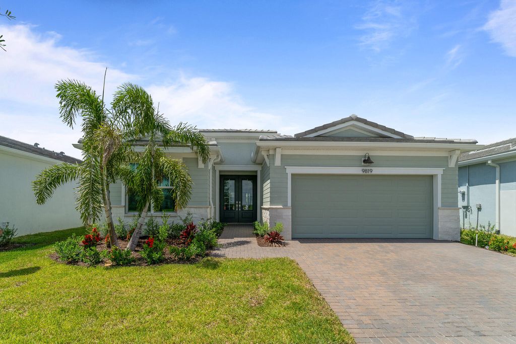 Photo of 9819 SW Veronese Drive, Port Saint Lucie, FL 34987 (MLS # R10972064)