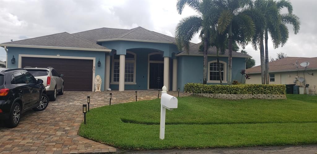 Photo of 561 SW Prater Avenue Ave SW, Port St Lucie, FL 34953 (MLS # R10740211)