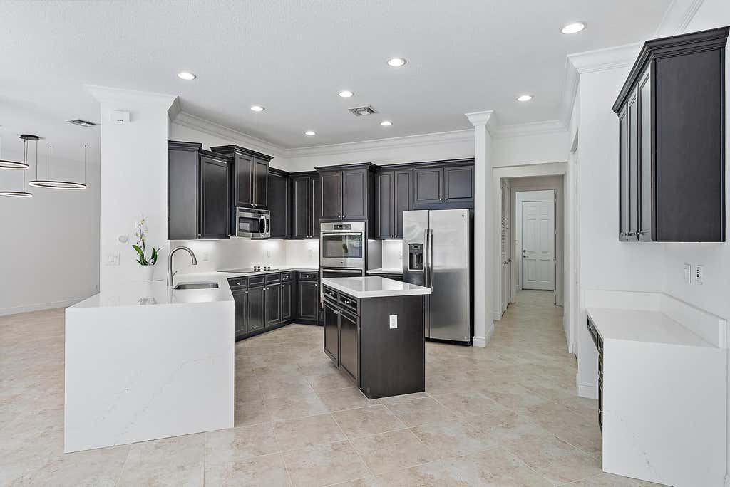 Photo of 301 Rudder Cay Way, Jupiter, FL 33458 (MLS # R11121282)