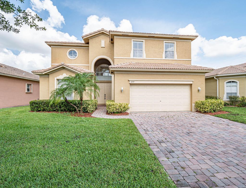 Photo of 5719 Place Lake Dr, Fort Pierce, FL 34951 (MLS # R10808637)