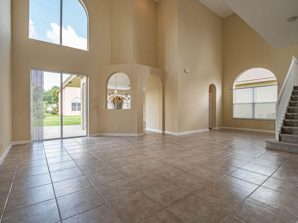 Photo of 5719 Place Lake Dr, Fort Pierce, FL 34951 (MLS # R10808637)