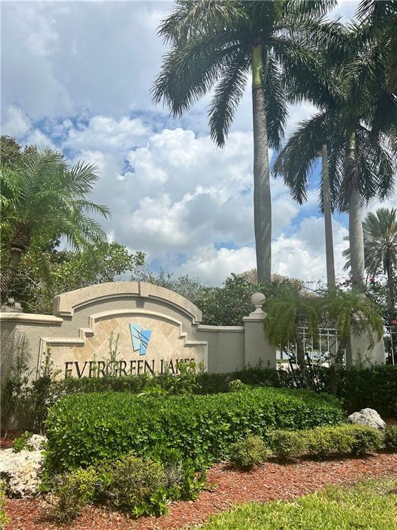 This spacious 3-bedroom, 2-bath condo offers comfortable living in the desirable gated community at Evergreen Lakes. Enjoy the split bedroom floor plan with a generous primary suite complete with an ensuite bathroom, walk-in closet, and private balcony access. Enjoy the open-concept living and dining space, convenient breakfast bar, and a kitchen featuring granite countertops and stainless steel appliances, plus the convenience of an in-unit full-size washer and dryer. Fantastic amenities include a community pool, hot tub, tennis courts, playground, fitness center, and jogging path. You'll appreciate the close proximity to the upscale Promenade at Coconut Creek offering an array of unique restaurants, shopping, and entertainment options just minutes away!