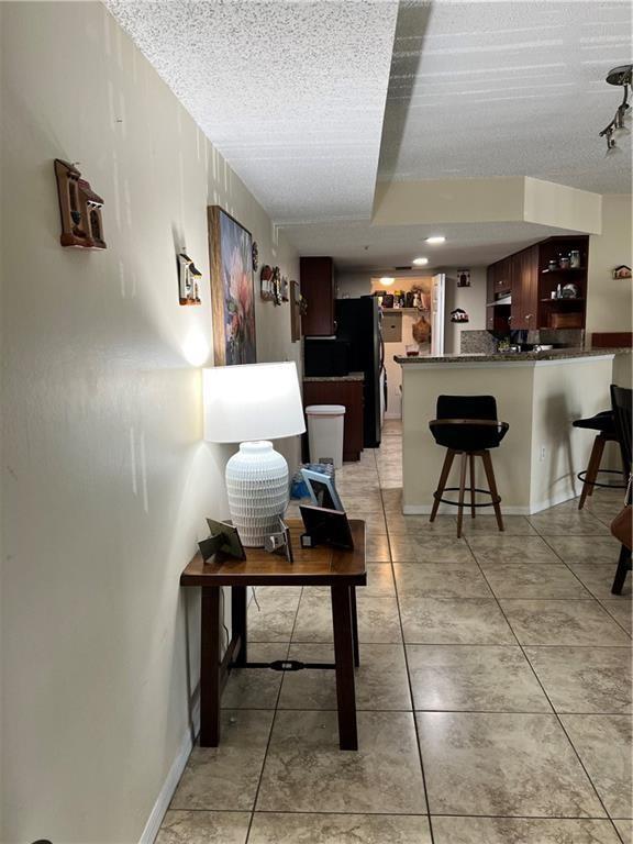 5065 Wiles Rd 203