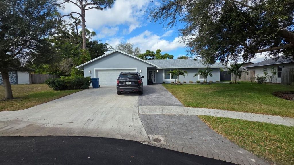 Photo of 131 Puffin Court, Royal Palm Beach, FL 33411 (MLS # R11158409)