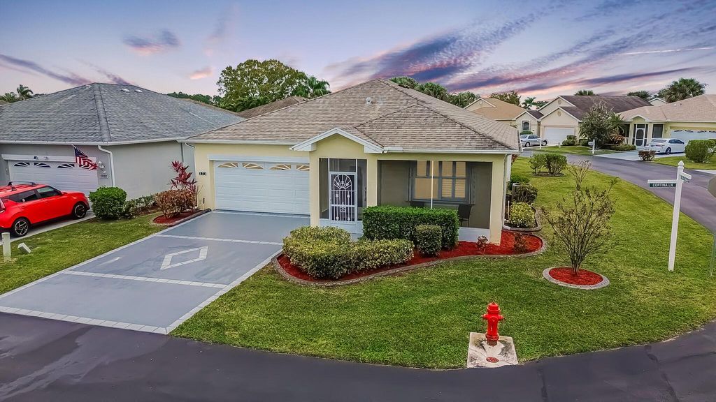 Photo of 571 NW Cortina Lane, Port Saint Lucie, FL 34986 (MLS # R11069830)