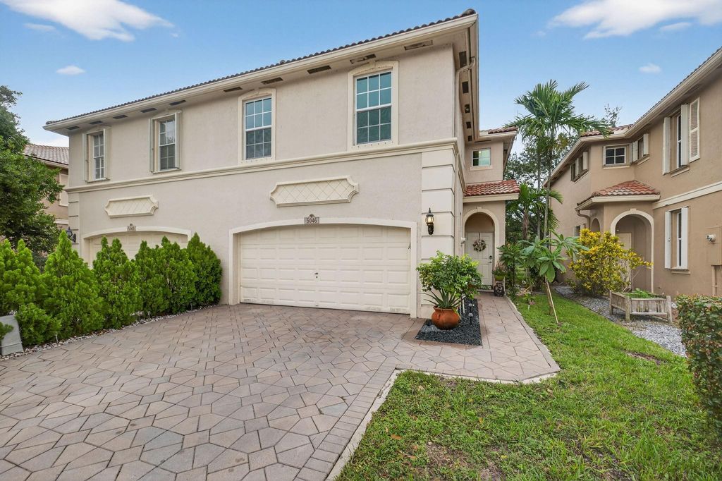 Photo of 5046 Stagecoach Dr #5046, Coconut Creek, FL 33073 (MLS # F10538955)