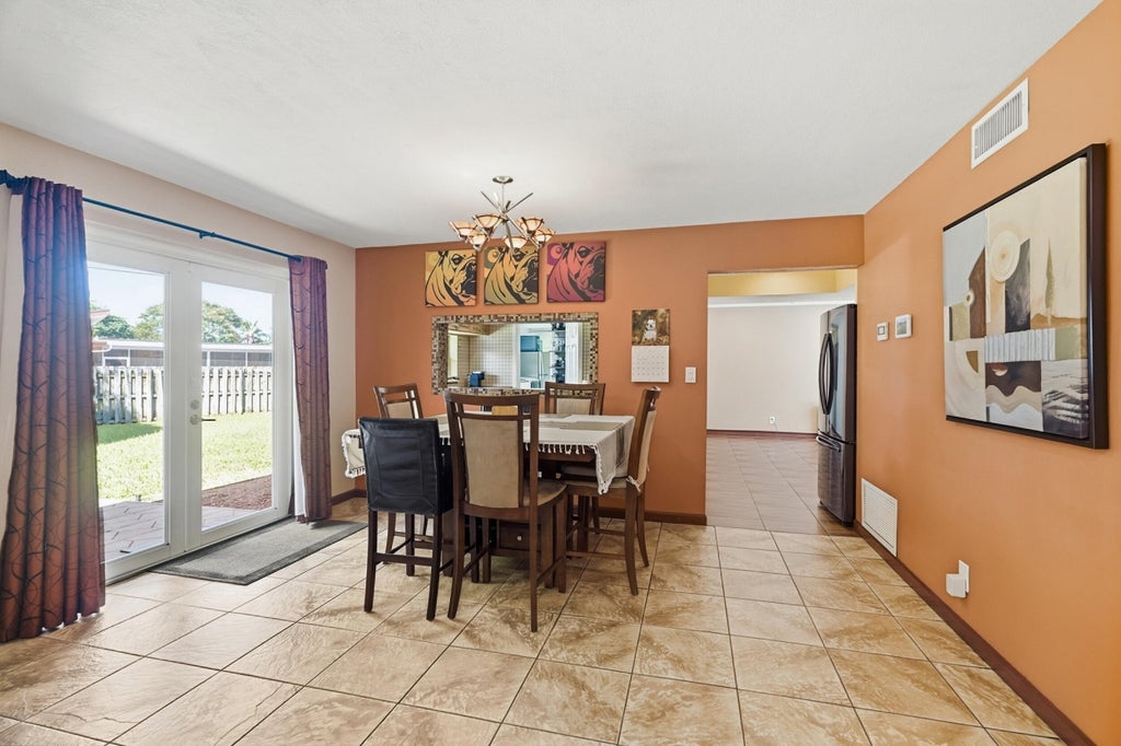 Photo of 4501 E COUNTRY CLUB Circle, Plantation, FL 33317 (MLS # B26085881)