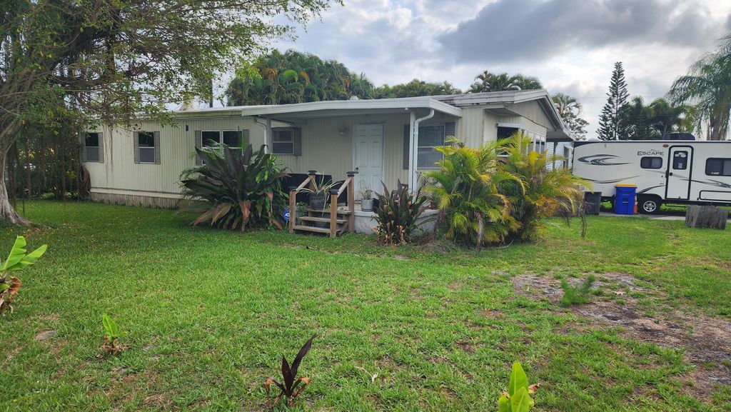 Photo of 2621 SE Galaxy Way, Stuart, FL 34997 (MLS # R10988641)