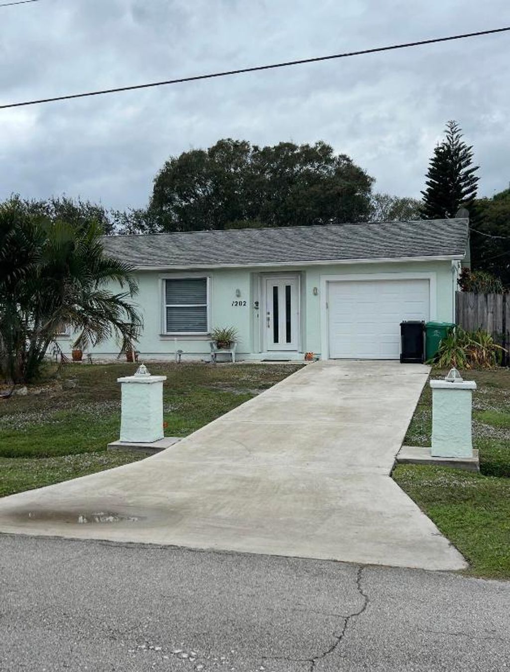 Photo of 1202 SW Heather Street, Port Saint Lucie, FL 34983 (MLS # R11154976)