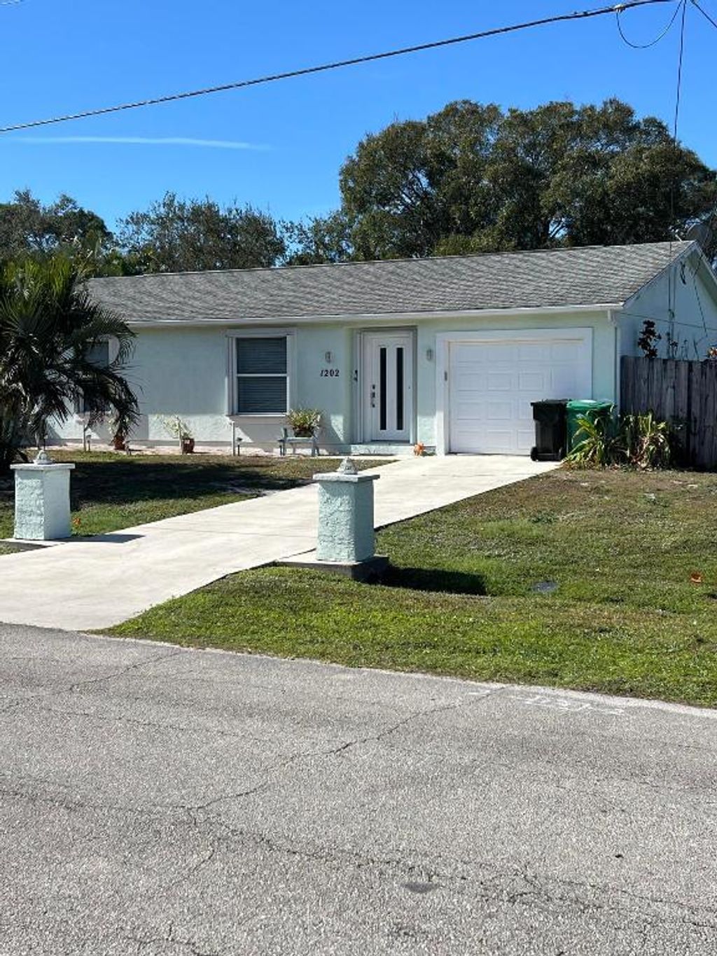 Photo of 1202 SW Heather Street, Port Saint Lucie, FL 34983 (MLS # R11154976)