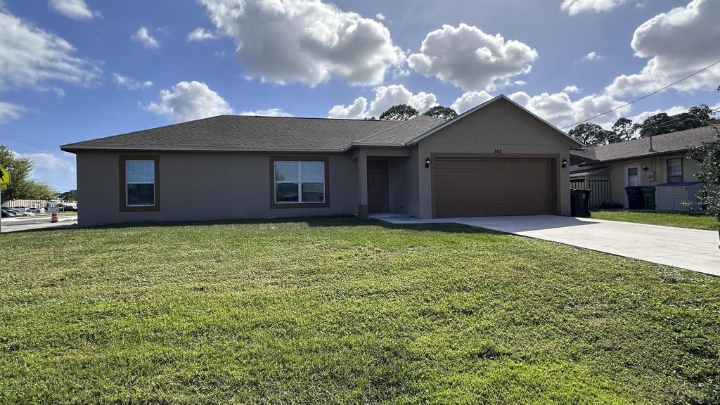 Photo of 842 SE Walters Ter, Port St Lucie, FL 34983 (MLS # R10930971)