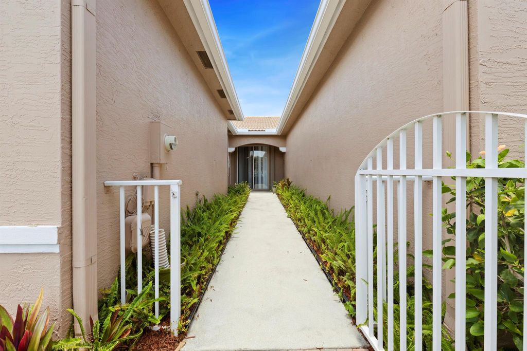 Photo of 8623 Mangrove Cay, West Palm Beach, FL 33411 (MLS # R11090059)