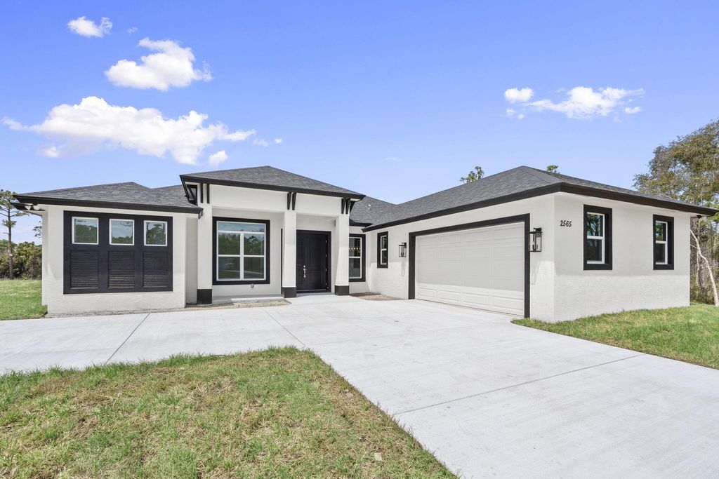 Photo of 2565 Dyer Road, Port Saint Lucie, FL 34952 (MLS # B26018205)