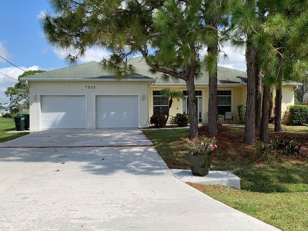 Photo of 5833 NW Corso Avenue, Port Saint Lucie, FL 34986 (MLS # R10784976)