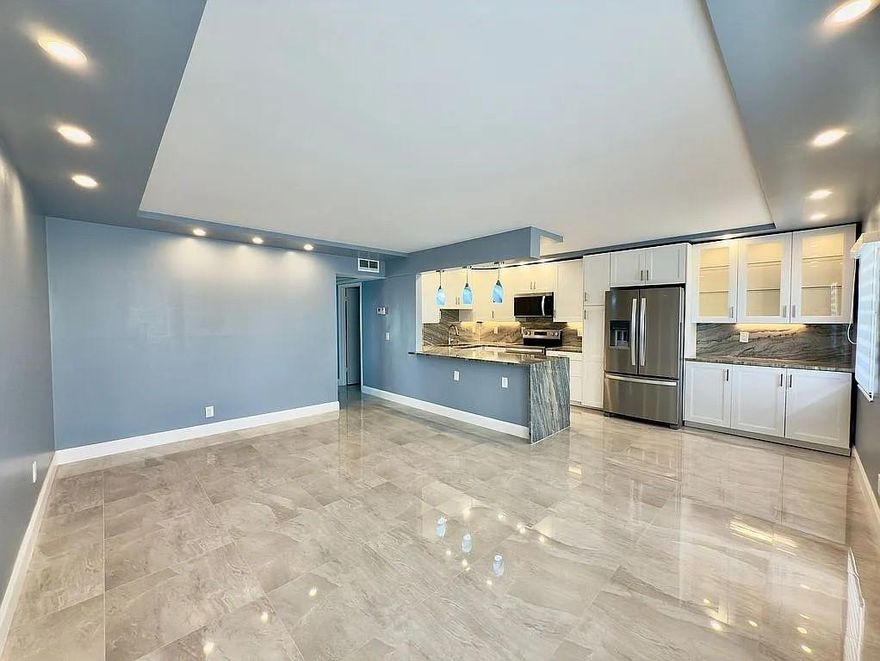 Fully renovated unit in the heart of Boca Raton, located in the desirable Guildford section of Century Village  ready for immediate move-in! This beautifully updated home features a brand-new kitchen, modern bathrooms with walk-in showers, elegant new countertops, an open-concept layout, all-new stainless-steel appliances, new tile flooring throughout, and custom window treatments. Enjoy stunning lake views from your private screened patio, perfect for relaxing mornings or peaceful sunsets. Century Village is a 55+ active lifestyle community offering exceptional amenities: indoor and outdoor pools, tennis courts, a state of the art clubhouse, library, theater, fitness center, and free shuttle service to local shopping. Water, basic cable, and internet are included the HOA fees.