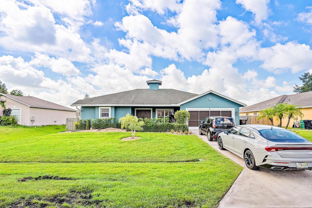 Photo of 114 SW Grimaldo Terrace, Port St Lucie, FL 34984 (MLS # R10903790)