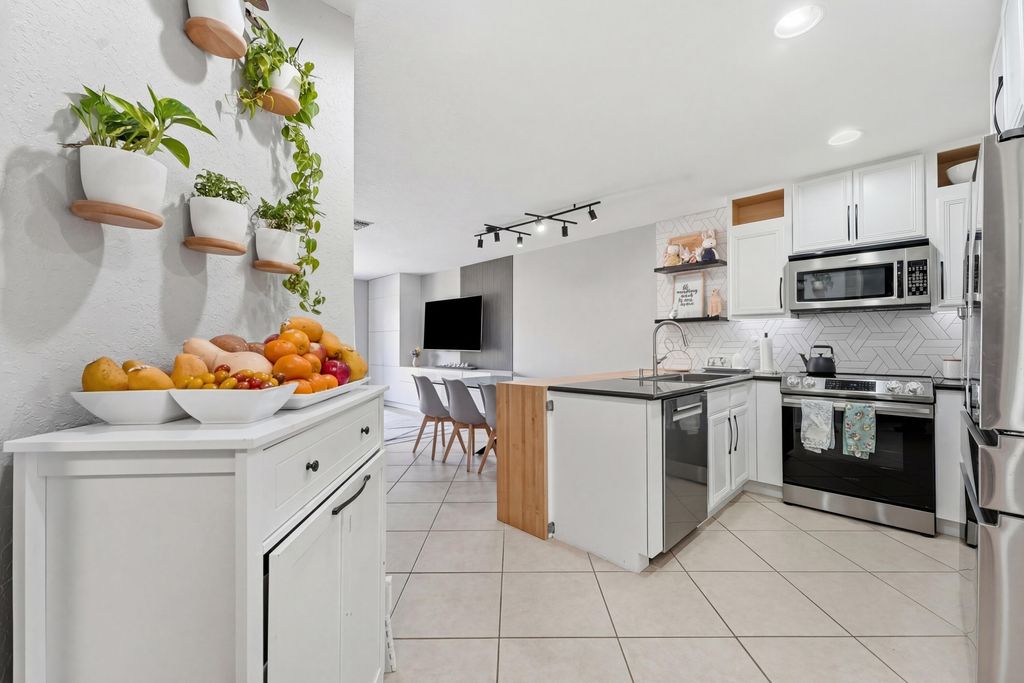 Photo of 2197 SW Rockport Road, Port Saint Lucie, FL 34953 (MLS # B26007494)