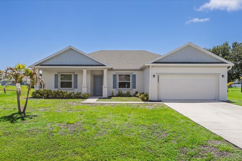 Photo of 2063 SE South Buttonwood Drive, Port Saint Lucie, FL 34952 (MLS # B26030924)