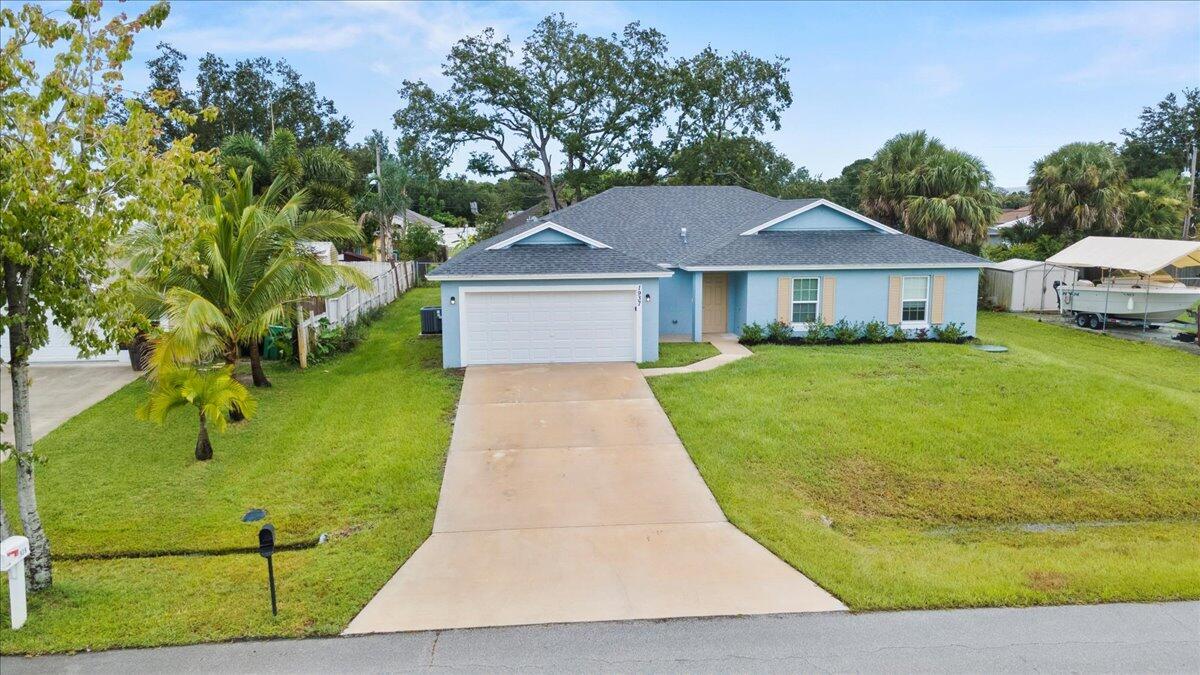 Stunning 4/3/2, barely lived in 2023 build by Synergy Hones. Includes a large second bedroom with ensuite, ideal as a private mother-in-law suite. Great open concept with over 2,000 sq ft of living space. Prime location near Tradition, I-95, schools, parks, shops, beaches, and golf. Move-in ready!