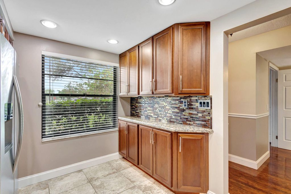 Photo of 2001 Sabal Ridge Court #C, Palm Beach Gardens, FL 33418 (MLS # R11065099)