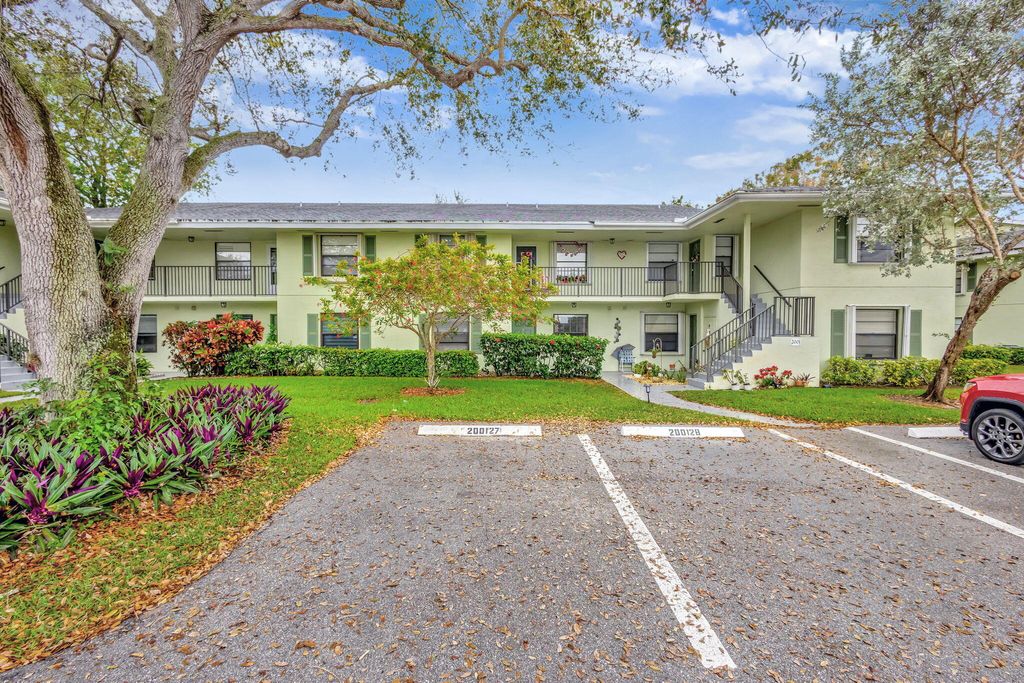 Photo of 2001 Sabal Ridge Court #C, Palm Beach Gardens, FL 33418 (MLS # R11065099)