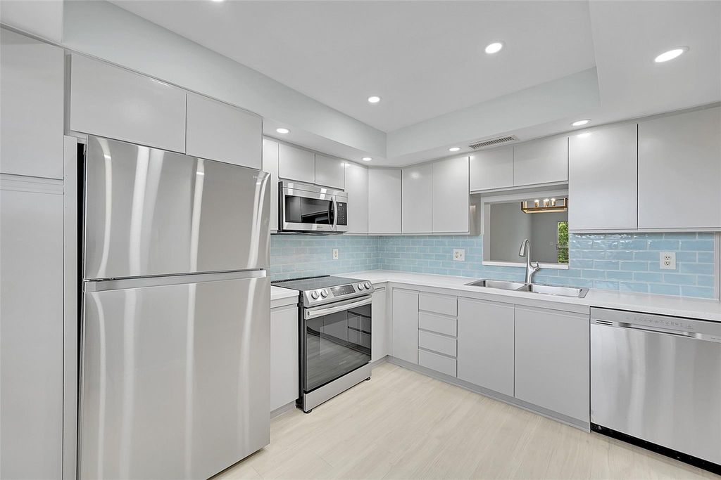 Photo of 2004 Granada Drive #B4, Coconut Creek, FL 33066 (MLS # F10523932)