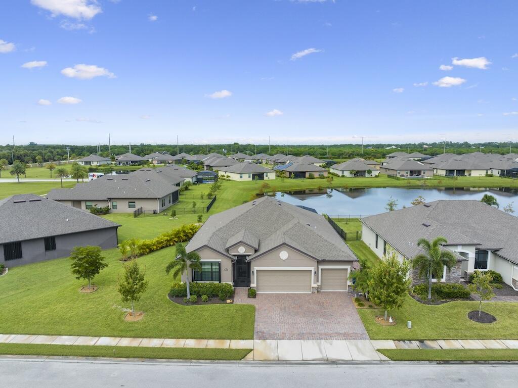2020 Built CBS home, located in a small community of just 73 homes! Pride of ownership shows in this 3 bedroom, 3 bathroom home located in the heart of Vero Beach. The chef's kitchen features upgraded cabinets and appliances, a double island, and more. The lakefront, oversized lot features a custom, in ground pool and spa, fully screened and fenced for your comfort and furry friends. Accordion shutters and generator hookup make this home ready to weather any storm. Why build when you can take advantage of the owner installed upgrades!