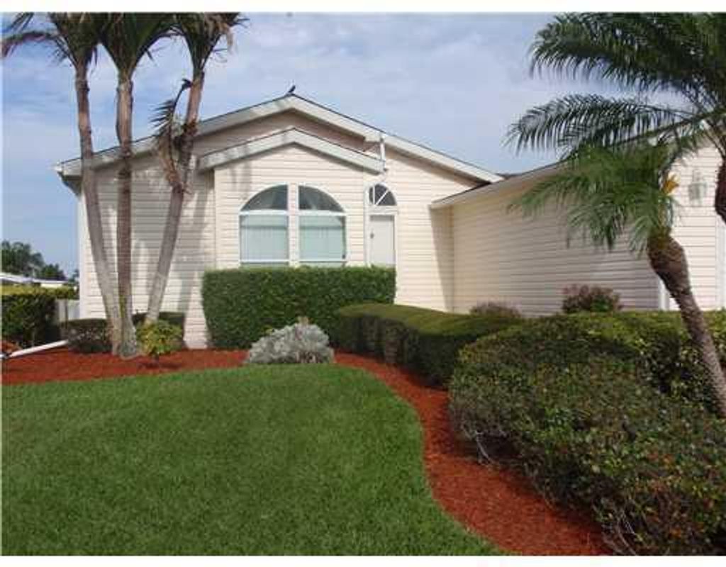 Photo of 8016 Meadowlark Lane, Port Saint Lucie, FL 34952 (MLS # R10954986)
