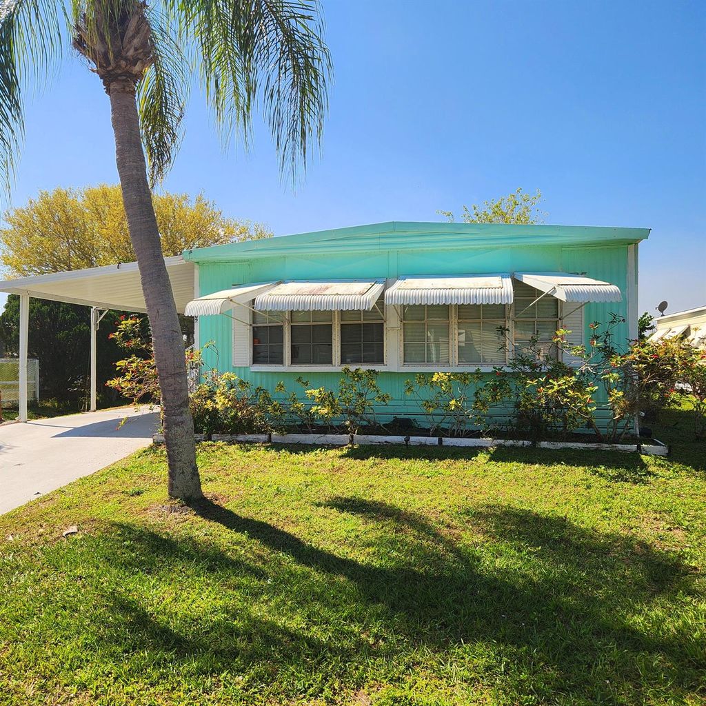 Photo of 82 E Caribbean, Port Saint Lucie, FL 34952 (MLS # R11066605)