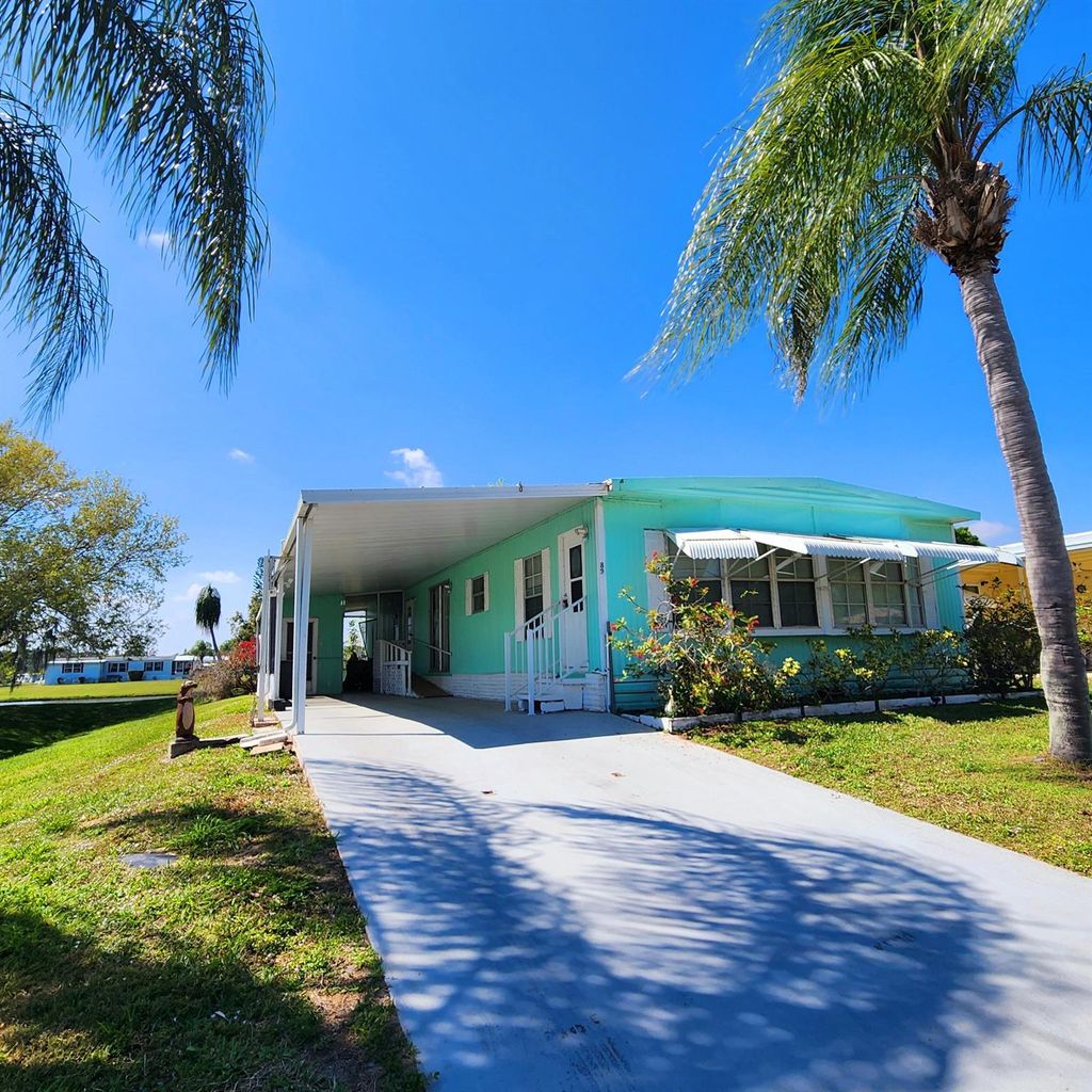 Photo of 82 E Caribbean, Port Saint Lucie, FL 34952 (MLS # R11066605)