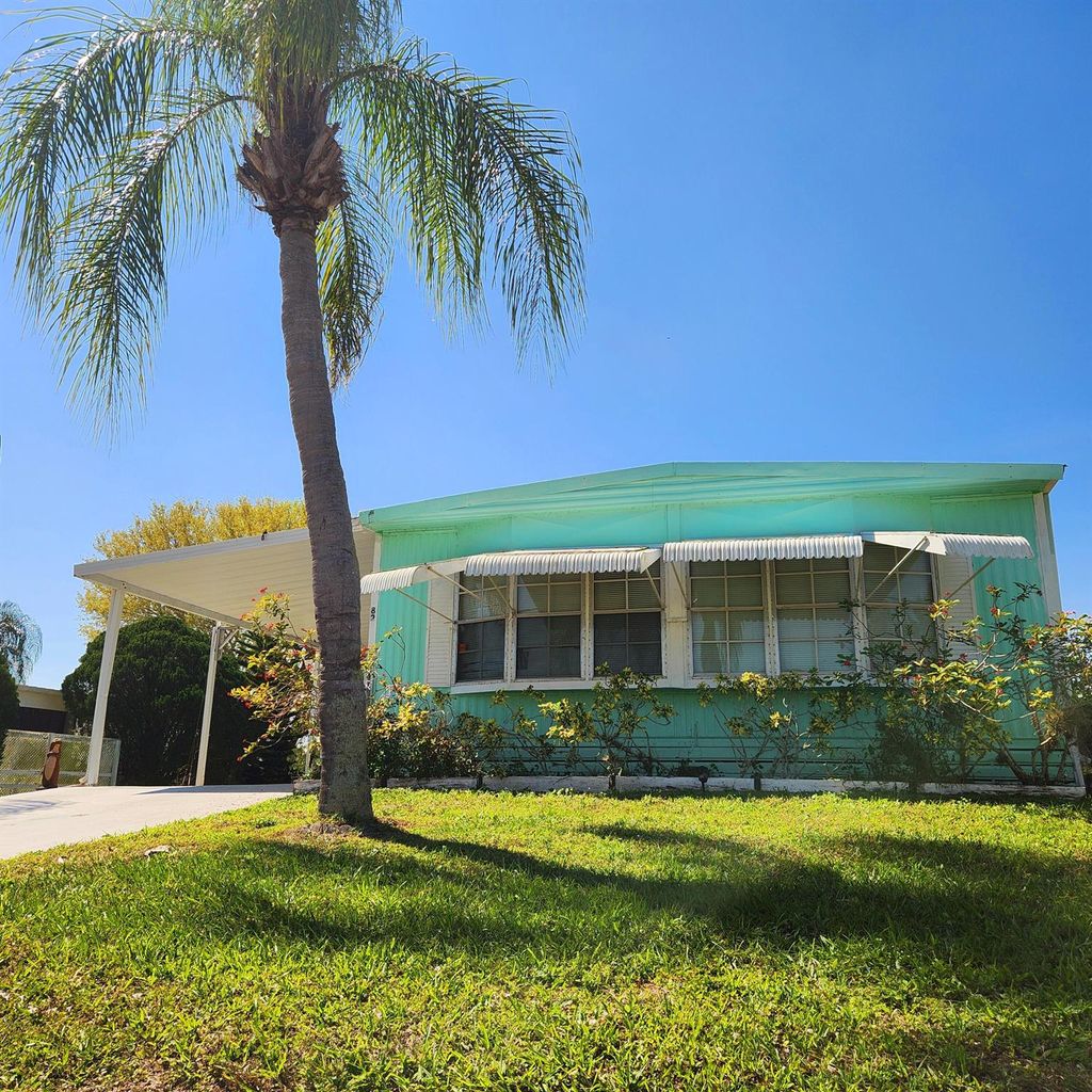 Photo of 82 E Caribbean, Port Saint Lucie, FL 34952 (MLS # R11066605)