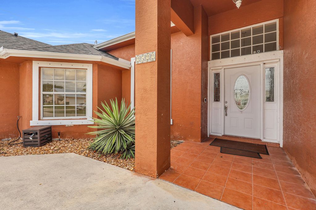 Photo of 2522 SE Lyman Circle, Port Saint Lucie, FL 34952 (MLS # B26034357)