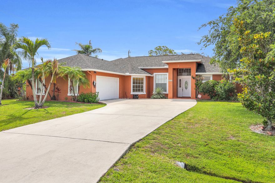 Situated on an oversized lot, this beautifully updated 3-bedroom, 2-bath, 2 car garage CBS home offers comfort, style, and modern efficiency. Inside, you'll find tile throughout, an open concept floor-plan and an large kitchen with a cozy breakfast nook, perfect for everyday living and entertaining. The spacious primary suite features a relaxing soaking tub and separate walk-in shower. Step outside to enjoy the white privacy fence surrounding the backyard, creating the perfect outdoor retreat. Additional highlights & upgrades include a Tesla charger in the garage, 25 yr warranty solar panels, water filtration system at the kitchen sink, 2022 A/C, and a Brand new Roof installed in late 2025. Home is close to shopping, beach, restaurants, medical, & more.