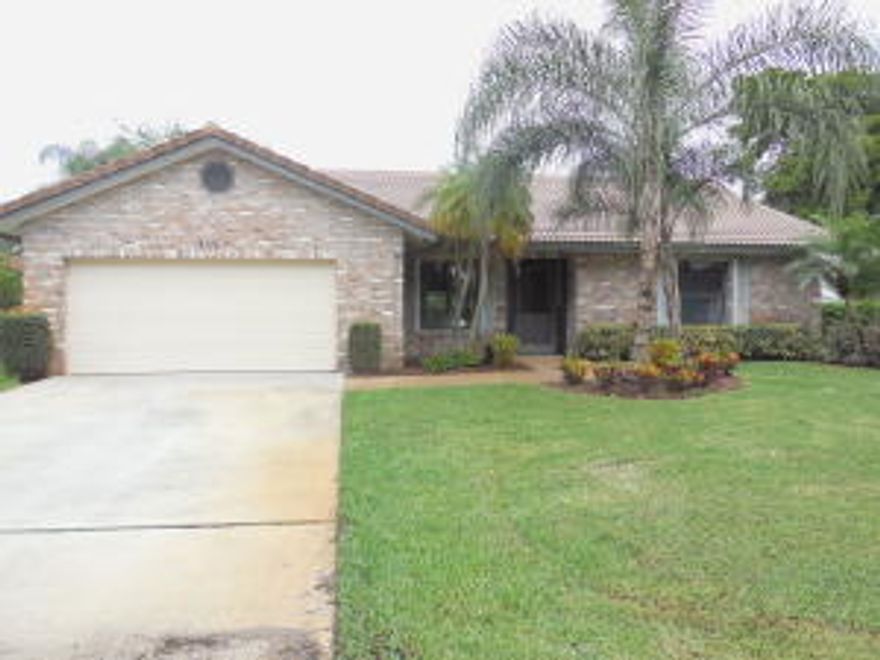 TOTALLY REMODELED WITH NEW KITCHEN AND BATHS, NEW FLOORING  IN LIVING AREAS,
NEW CARPET IN BEDROOMS. CORNER LOT WITH PRIVATE POOL AND FENCED IN BACK YARD.
GRANITE COUNTERS, STAINLESS STEEL APPLIANCES.IMPACT DOORS, DESIRABLE CORAL SPRINGS LOCATION WITH A RATED SCHOOLS. SEE IT AND FALL IN LOVE WITH YOUR NEW HOME.