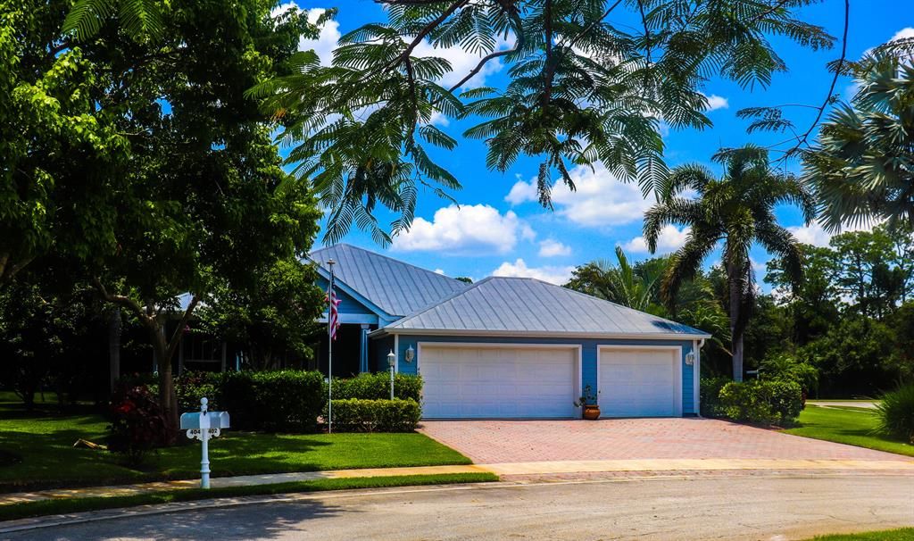 Photo of 402 NE Ginger Lily Place Pl, Port Saint Lucie, FL 34983 (MLS # R10813262)