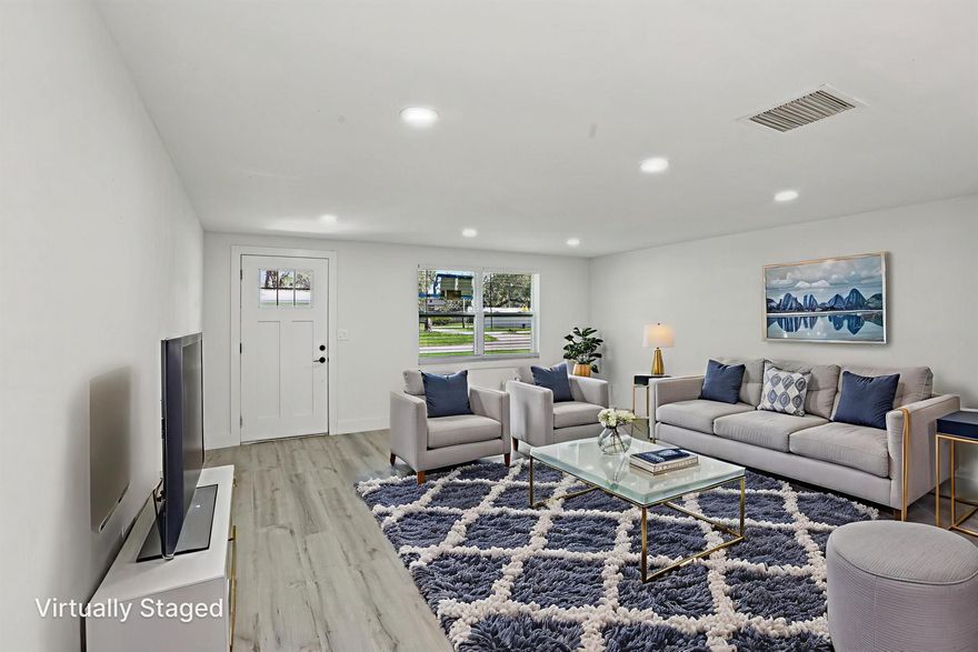 This home is ready for a new chapter with complete renovations throughout! Beautiful new kitchen featuring quartz countertops, new bathrooms with ceramic tile showers, completely new HVAC system, new electrical throughout, new windows, flooring, doors and trim throughout. This is a brand new house! There are brand new stainless steel appliances in the kitchen, as well as new and stylish washer and dryer laundry combo in a separate area in the garage. The home features a large living room, separate dining room, and nook area perfect for an office. Also, the property has a new privacy fence installed.