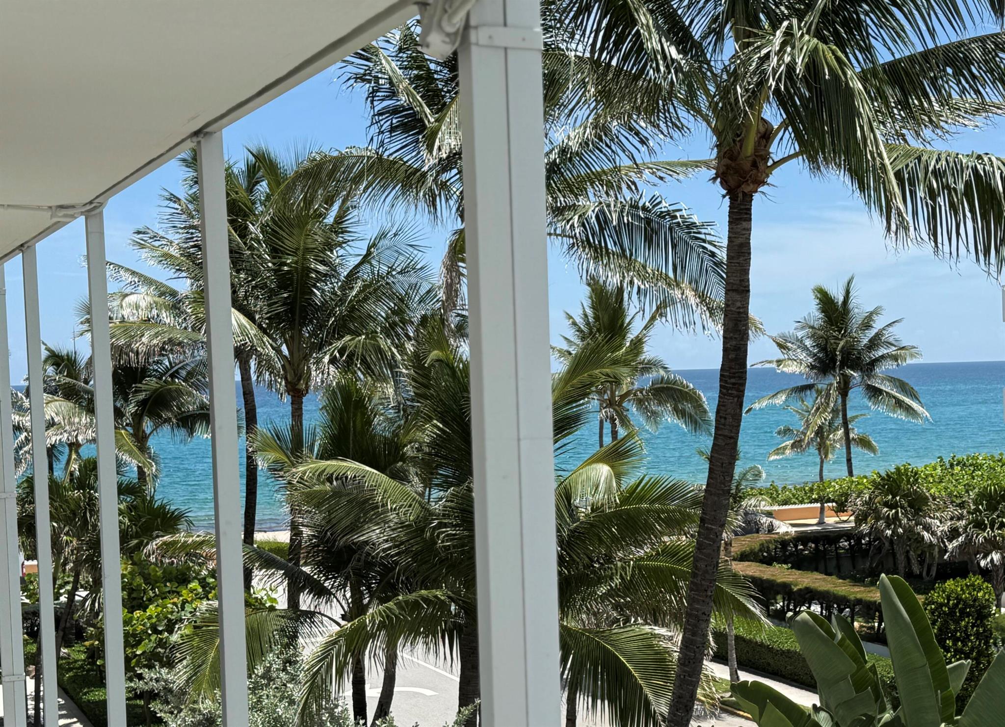 No better way to experience Palm Beach then a seasonal rental right in the middle of everything. The 400 Building is a cool Modernist classic, a landmarked building by Edward Durell Stone, and this south-facing duplex is the epitome of Stone's intentions. Completely renovated in 2018 with clean lines and an open floorplan. A beautiful kitchen island, perfect for entertaining, anchors the first level with seasonal light pouring in from the 10' tall living room windows off the terrace. Up the internal stairs to the bedroom level you'll find a large south-facing primary bedroom with ocean views and a north facing guest room with twin beds and a desk. Both have private baths and the primary bath even has an extra washer and dryer in addition to the full sized units adjacent to the kitchen