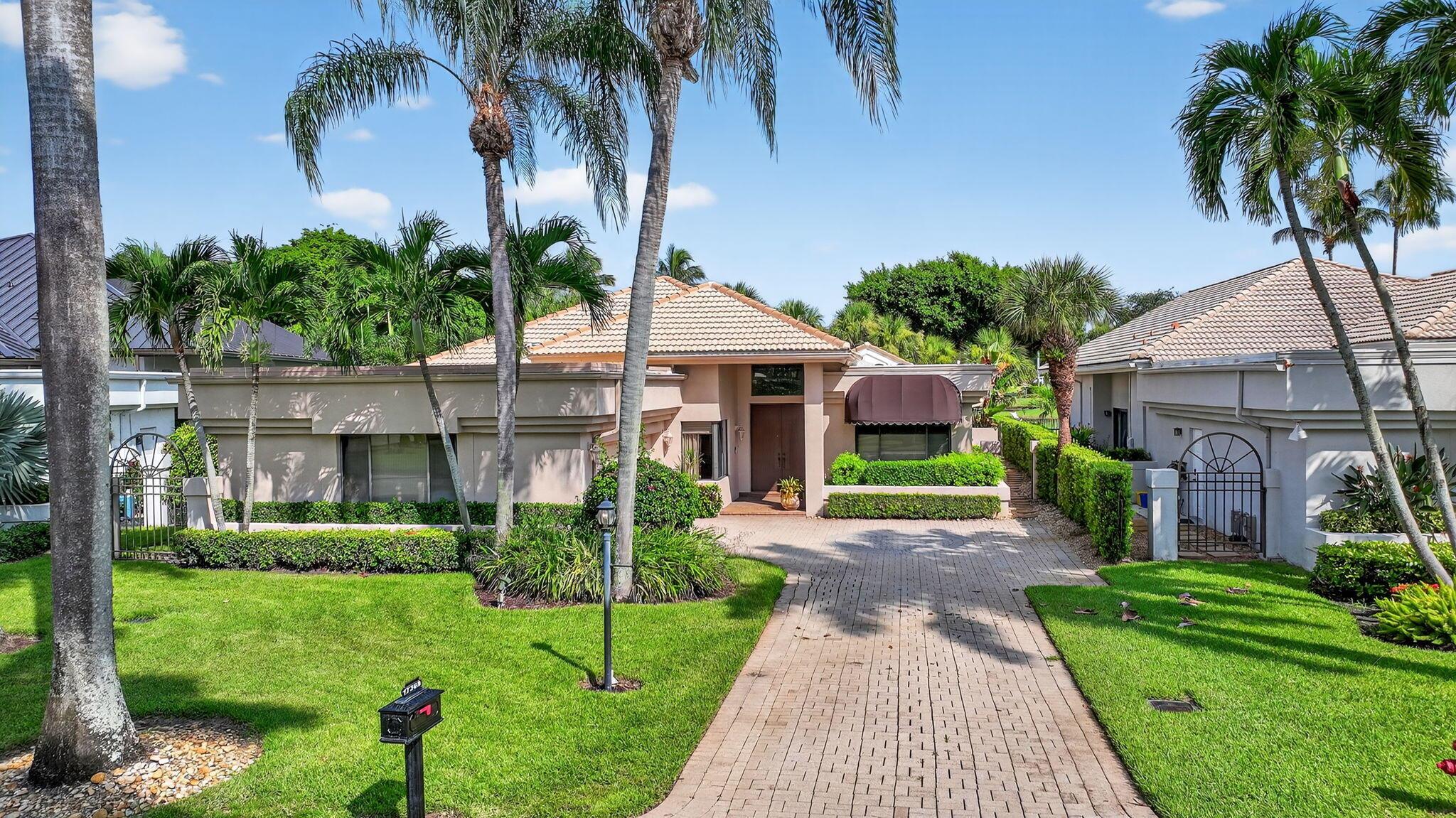 Lovely one-story, 3-bedroom home located in the desirable ''concierge'' section of St. Andrews Country Club. Master suite has abundant closet space and his & her bathrooms. Quiet location with lake and golf course views. Great opportunity to make it your own! Note: ''After'' photos are examples of a renovation completed on the same model.