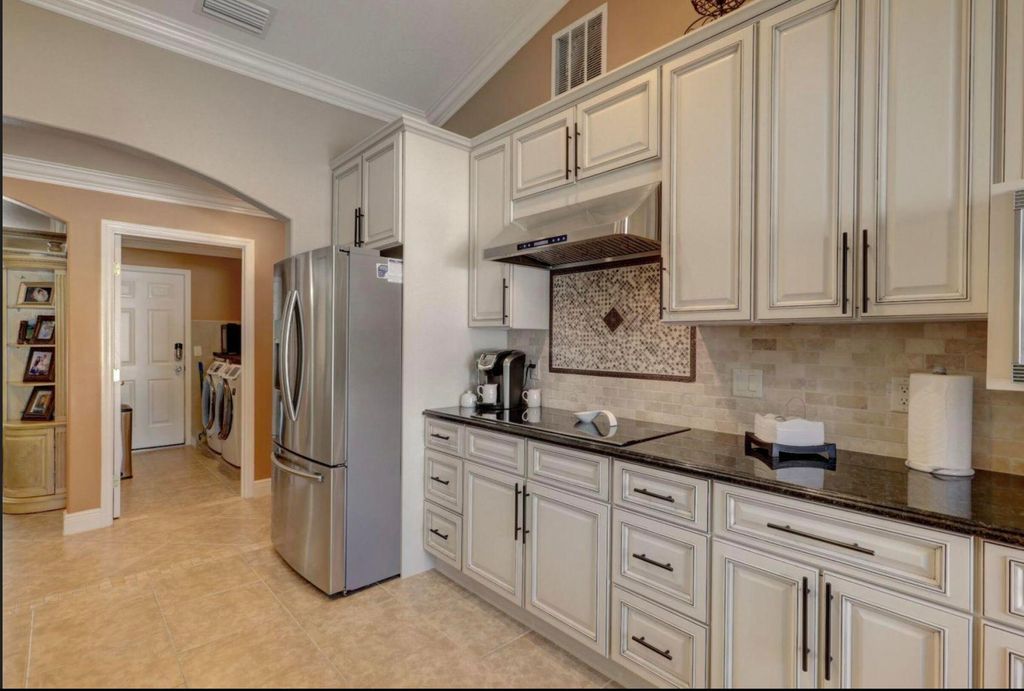 Photo of 2529 SW Grotto Circle, Port Saint Lucie, FL 34953 (MLS # R10800237)